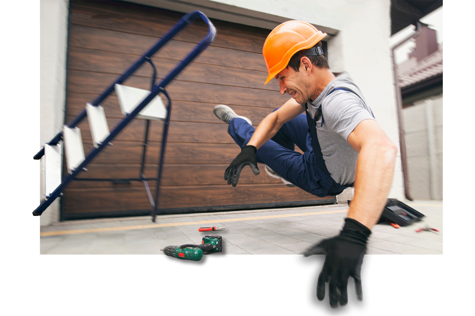 A construction worker in a hard hat falls off a ladder, dropping tools onto the ground.