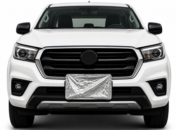 Front view of a white pickup truck with a covered license plate on a white background.